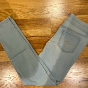 Mid rise light wash skinny jeans.